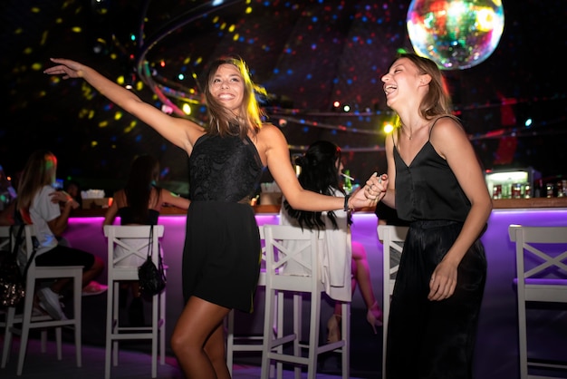 nightlife people having fun in bars and clubs