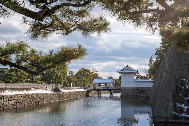 Nijo Castle Inner stone walls and moat with snow in winter Kyoto Japan