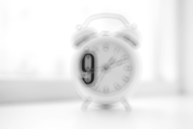 Photo nine o'clock morning clock bokeh background hd