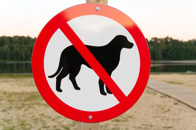 No dog sign on a city beach. no pets allowed sign.