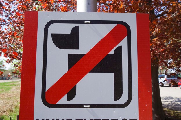 A no dogs allowed sign ban of dogs in a specific area