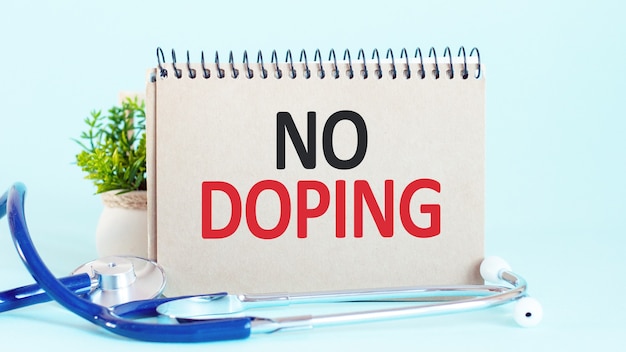 NO DOPING - diagnosis written on a white piece of paper. Treatment and prevention of disease.