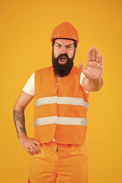 No entry stop dangerous zone man engineer protective uniform stop you architect builder engineer protective apparel for construction industry bearded hipster engineer senior engineer at site