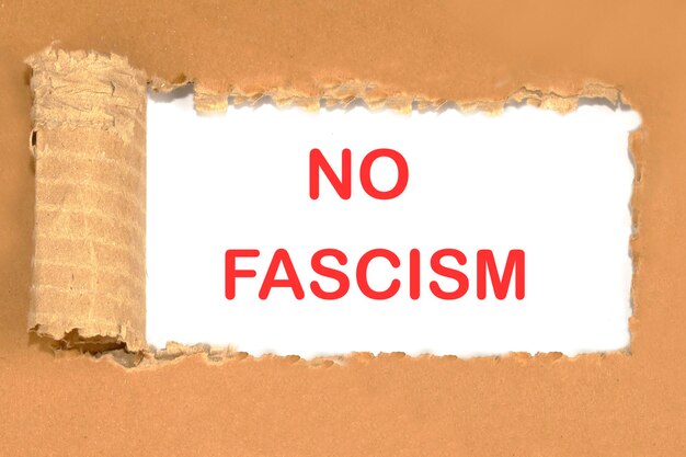 No fascism the phrase written on a piece of cardboard