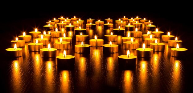 Photo no humans candle yellow theme black background sparkle