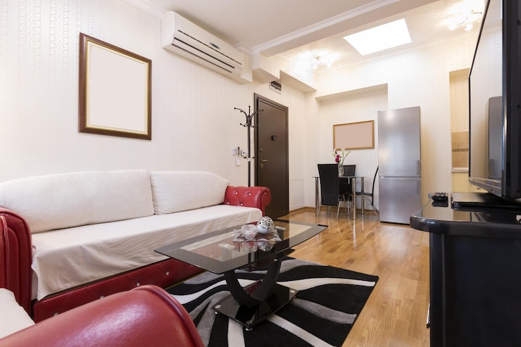 Photo no humans indoors scenery table television chair couch bed door bedroom carpet