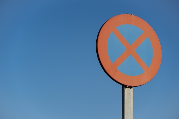 No parking traffic sign on blue sky background