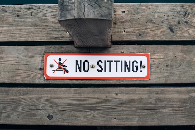 Photo no sitting sign