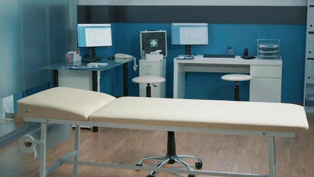 Nobody in office to do annual checkup visit and consultation. Empty medical cabinet where doctor works to treat patients at examination appointment, for health care diagnosis and medicine.