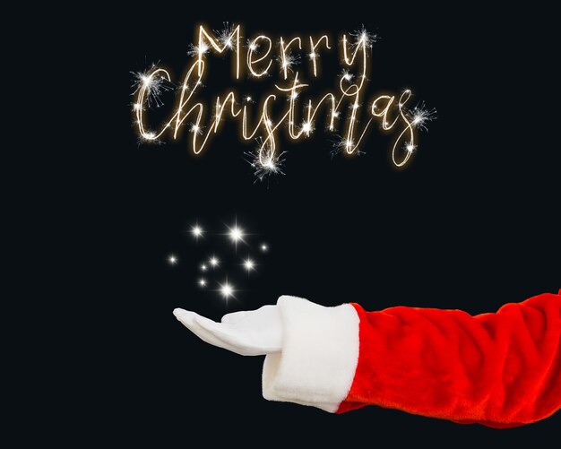 Noel hand with merry christmas message on black background