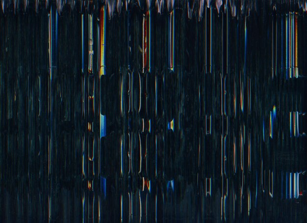 Photo noise overlay analog glitch texture damaged vhs tape blue orange color distortion artifacts on dark