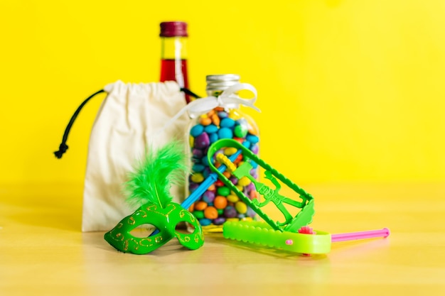 Noisemaker and mask for Purim celebration jewish carnival holiday