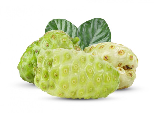 Noni fruit with leaf on white