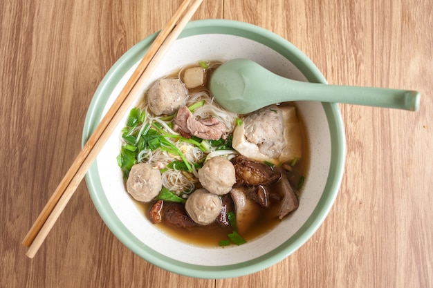 Noodle meat ball and pork tofu on soup, Thai noodle in the bowl