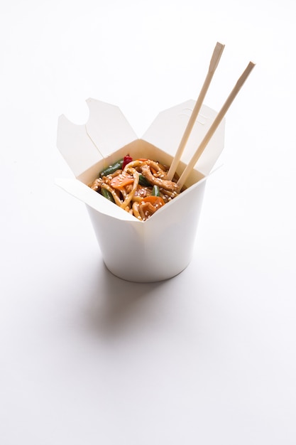 Noodle wok in white box on isolated background