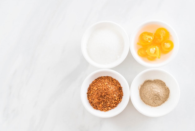 noodles condiments (sugar, chili powder, pepper, vinegar)