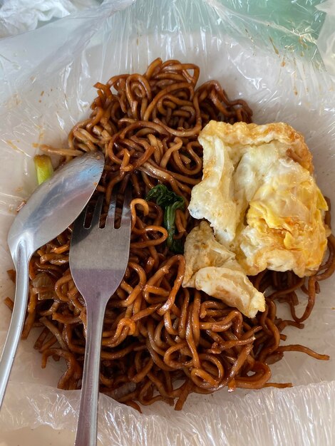 Photo noodles in plate on table