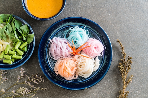 noodles with fish curry sauce and vegetable