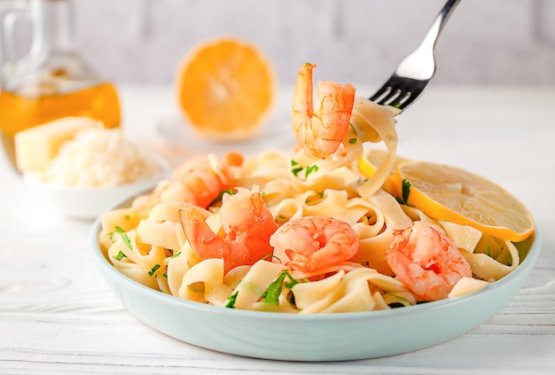 Noodles with shrimp lemon and chopped parsley