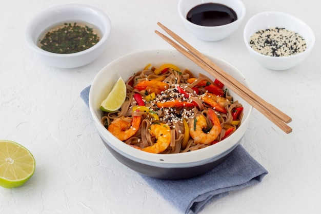 Noodles with shrimps, pepper and soy sauce.