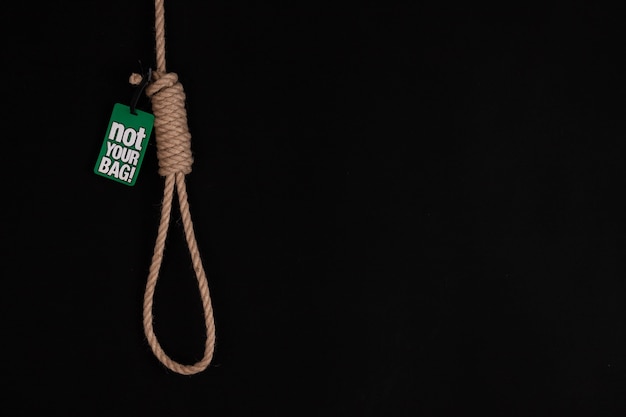 The noose against sullen background, failure or commit suicide concept