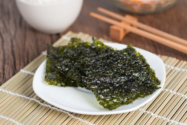 Nori sheet dried seaweed, Crispy seaweed on plate.