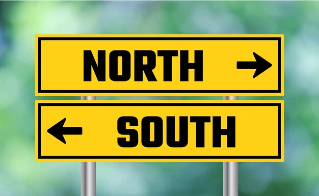 North or south road sign on blur background