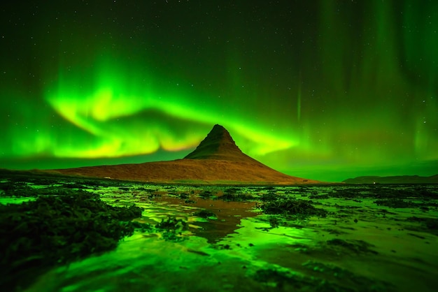 Northern light over Kirkjufell mountain in iceland