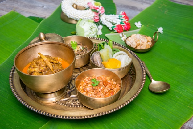 Northern Thai food with banana leaf background