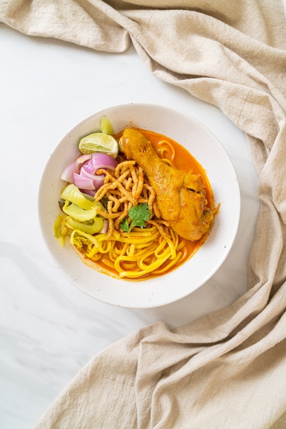 Northern Thai noodle curry soup with chicken