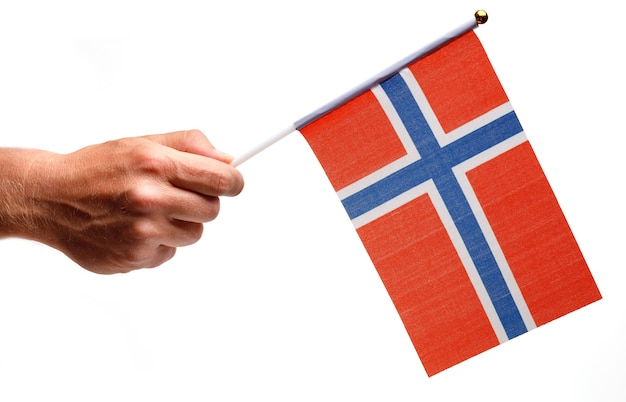 Norway flag small in hand isolate.