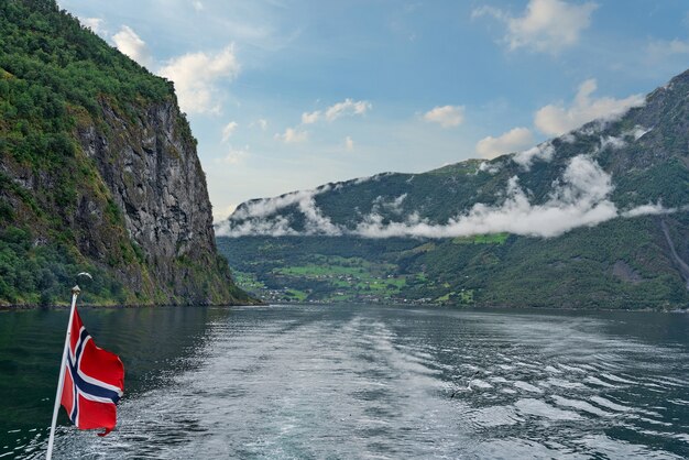 Norway, Sognefjord sea landscape with Norwegian flag