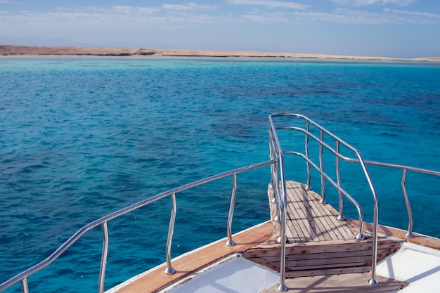 Nose walking yacht on sea background. Sea and travel concept