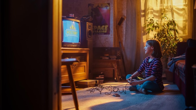 nostalgic retro concept young girl playing oldschool eighties arcade video game on a console at home in the room with periodcorrect interior successful kid passes the level with flying colors