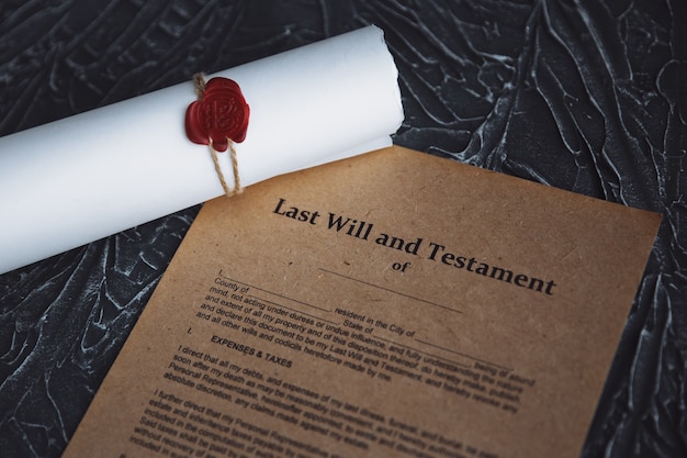 Notary's public pen and stamp on testament and last will. Notary public tools