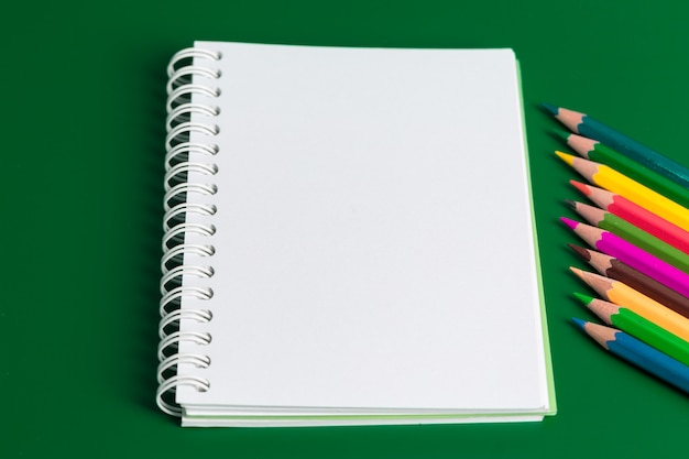 Note book and colored pencils