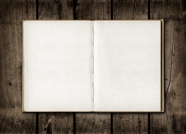 note book on a dark wood background