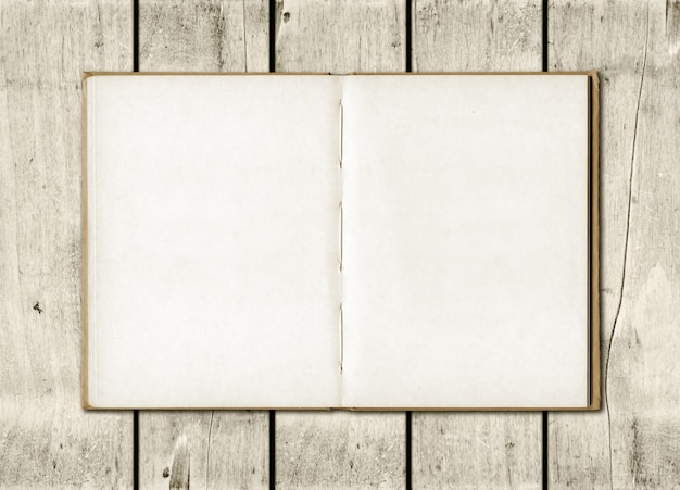 Photo note book on a white wood background