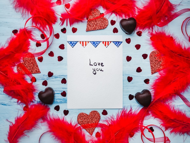 Note with sweet words of love. Flat lay