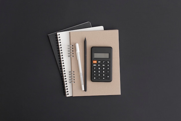 Notebook on black leather background