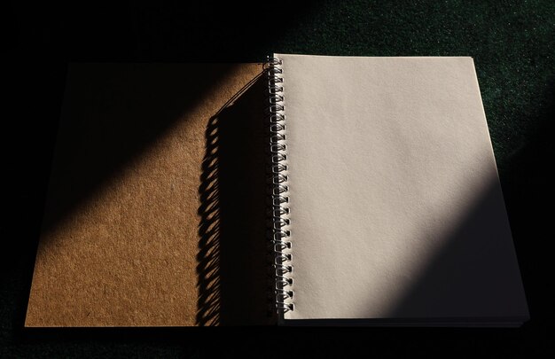 Notebook on the black office table