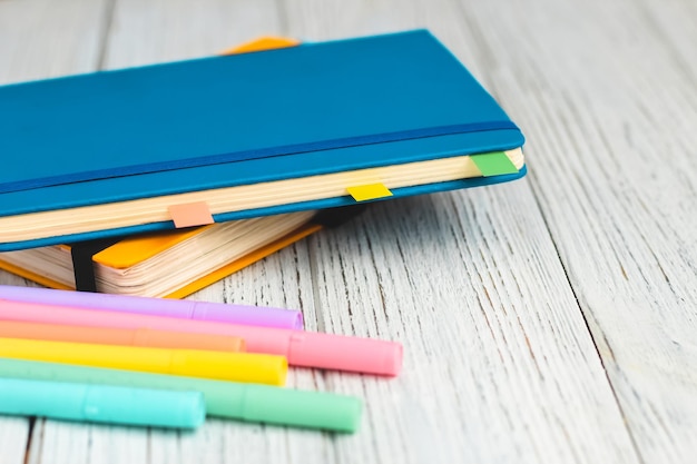 Notebook diary for planning in blue and yellow and colored cardboard for creativity