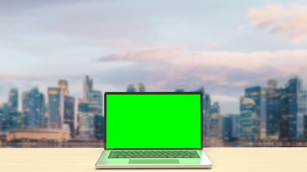 The notebook display green screen on rooftop building for present concept 3d rendering