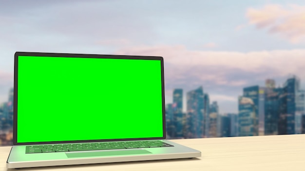 Photo the notebook display green screen on rooftop building for present concept 3d rendering