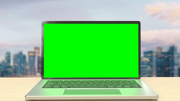 The notebook display green screen on rooftop building for present concept 3d rendering
