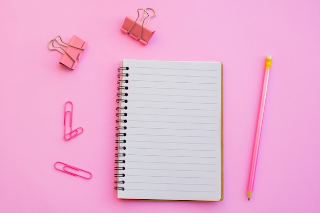 Notebook and equipment back to school on color background.