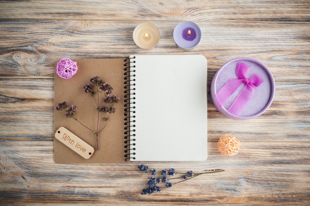 Photo notebook, lavender flowers, candles