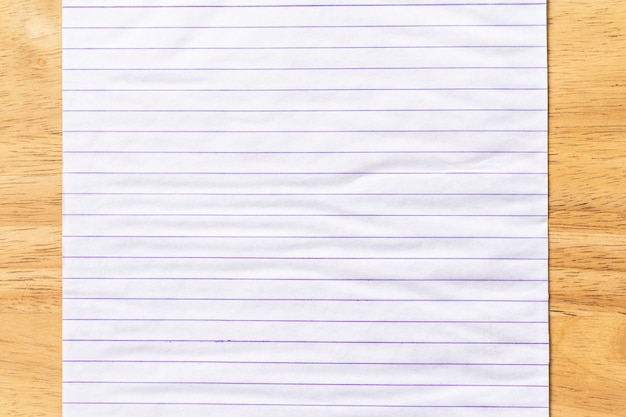 Notebook Lined Paper on wood Background