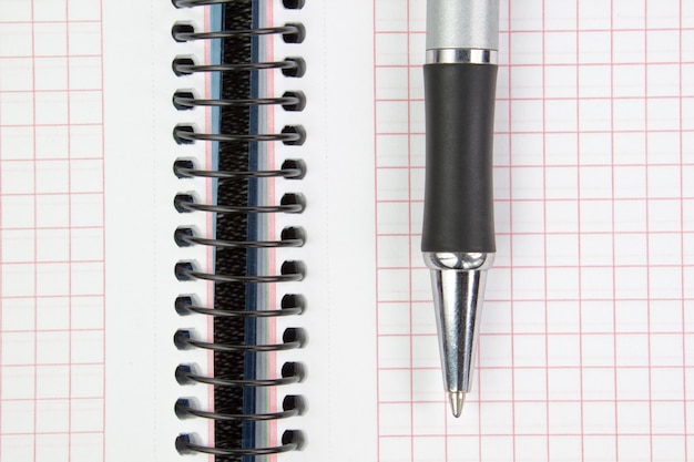 Notebook and pen closeup.