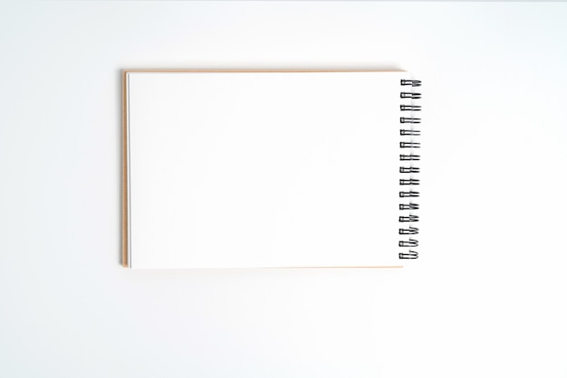 A notebook on a spring. Isolated on white background.